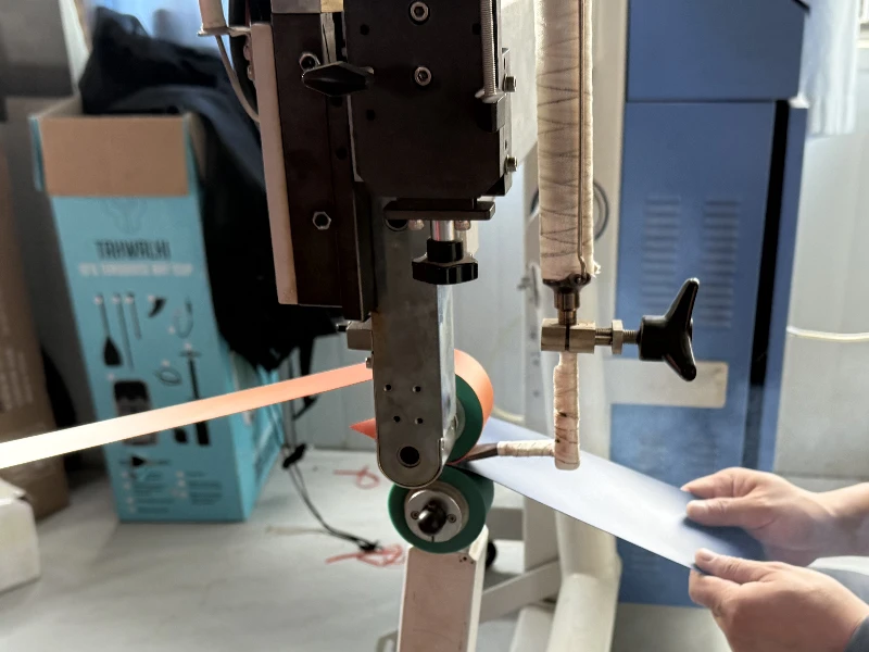 The heat-sealing machine seals the edges of the materials, ensuring that every piece of raw material bonds tightly together
